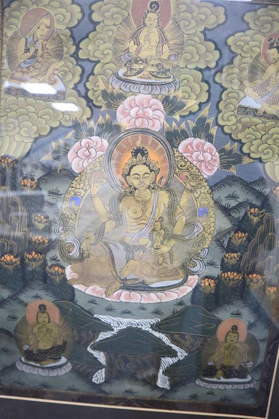 A Tibetan painted thangka, image 44 x 32cm